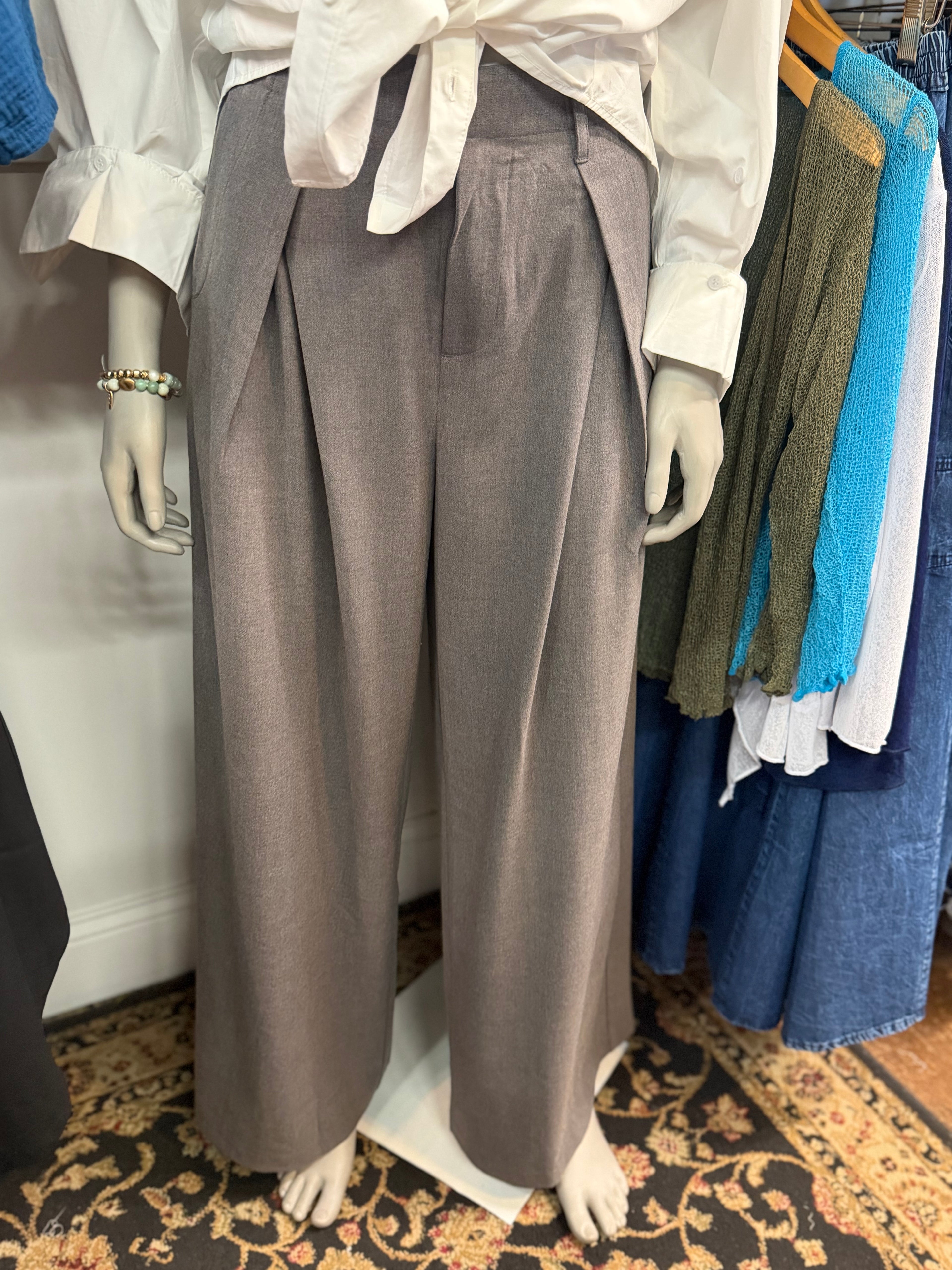 grey pleated trousers