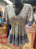 Blue print smocked bodice flutter short sleeve top