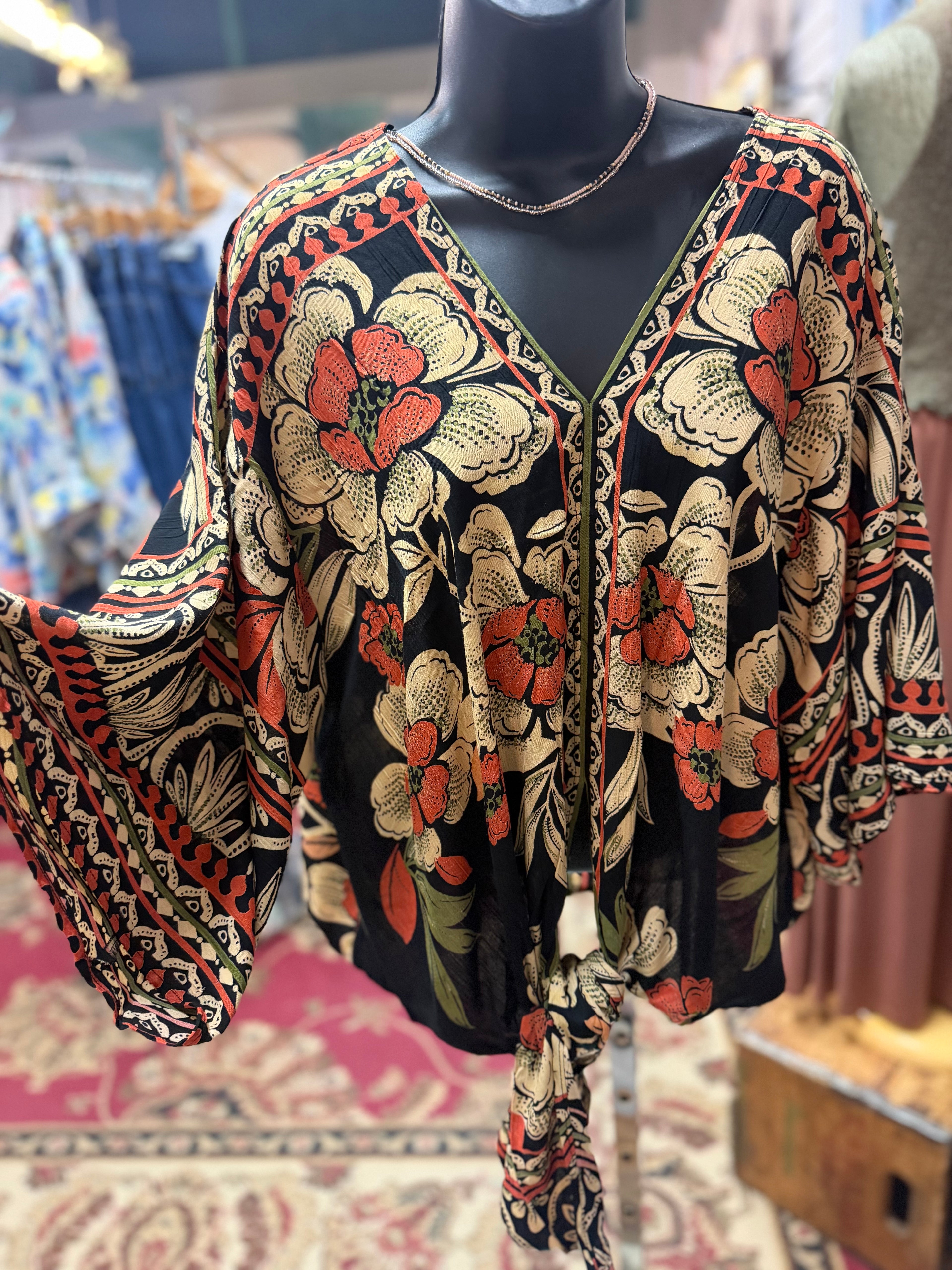 Black print kimono style blouse with tie front