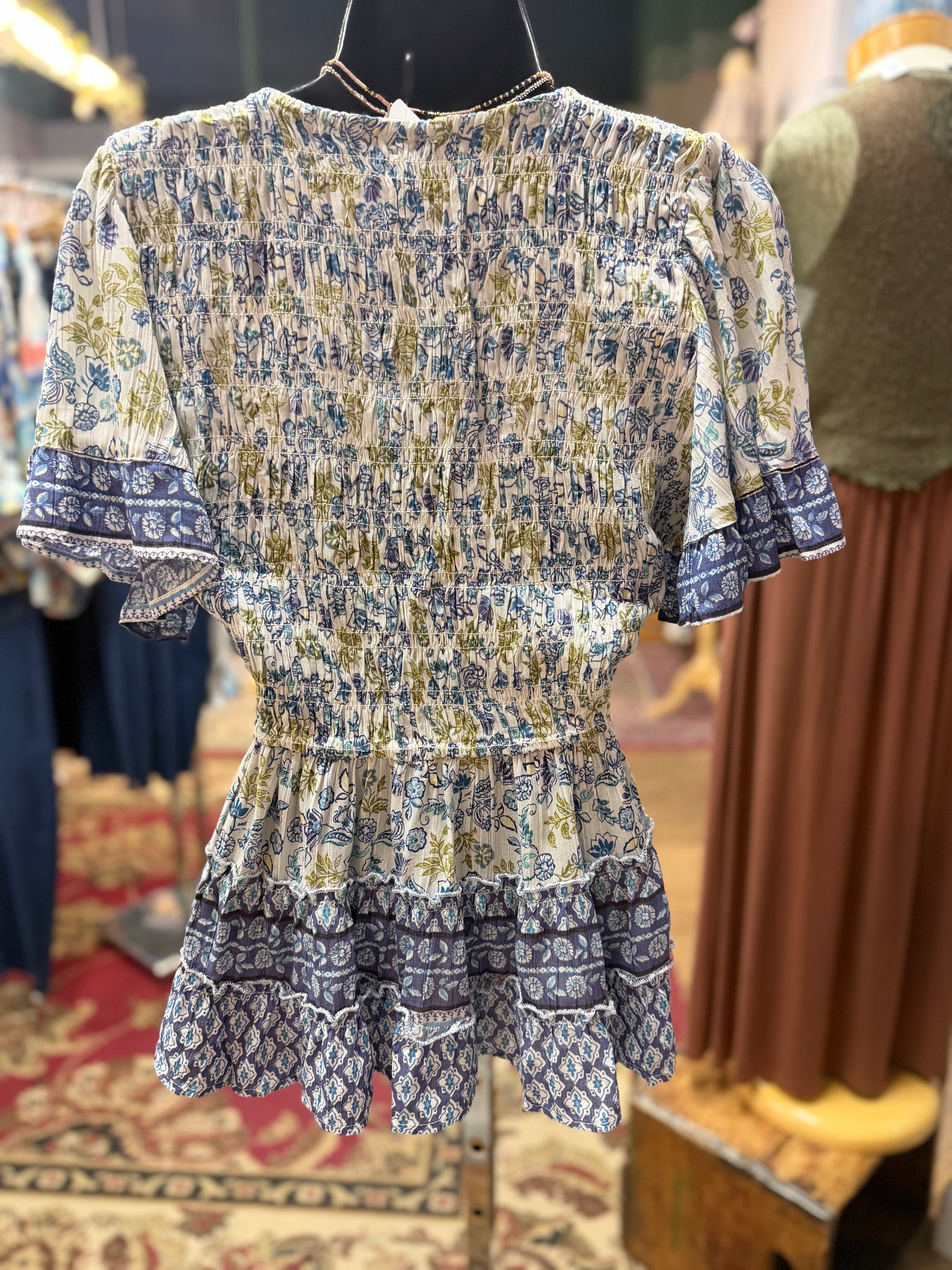 Blue print smocked bodice flutter short sleeve top