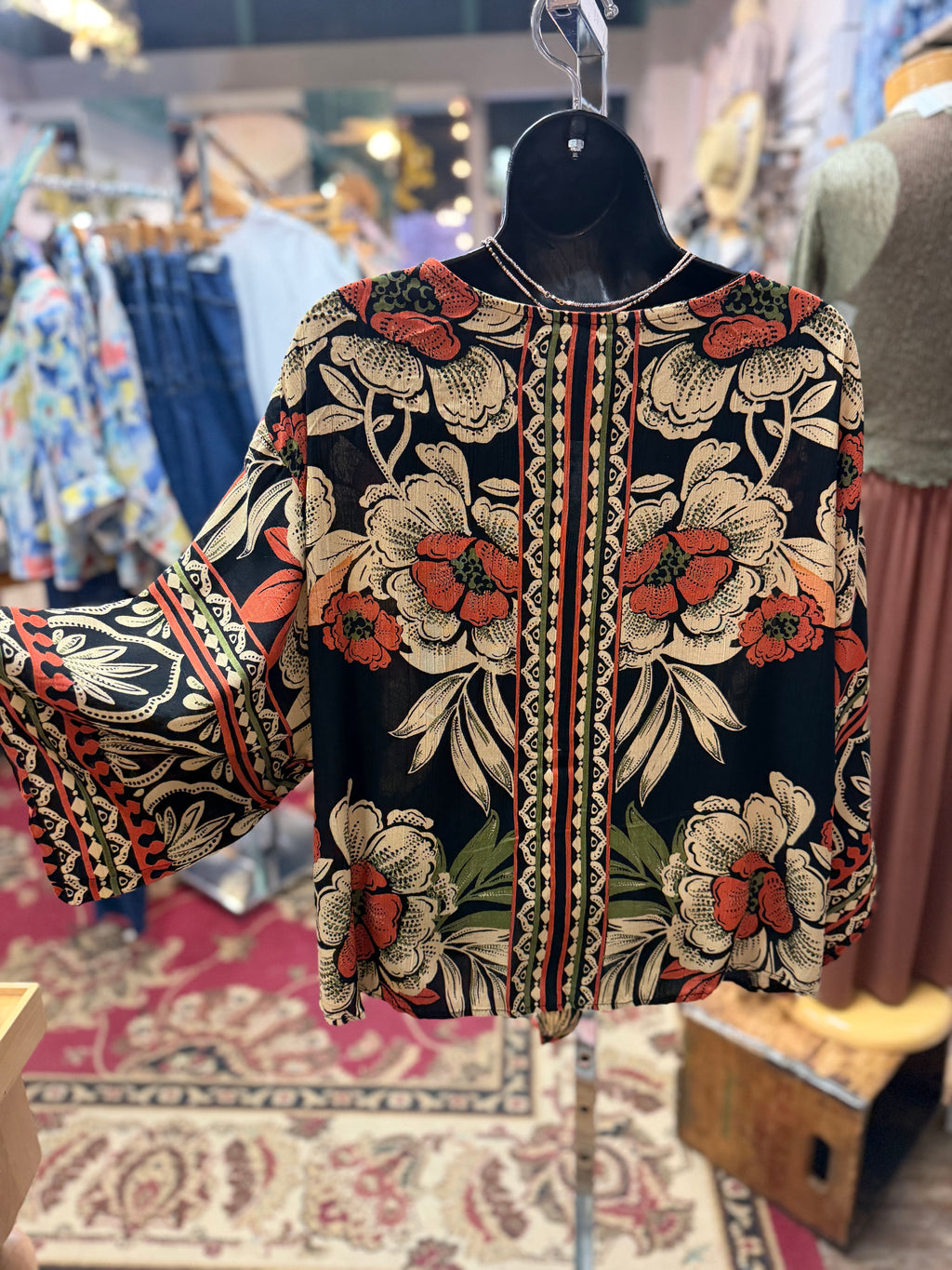 Black print kimono style blouse with tie front