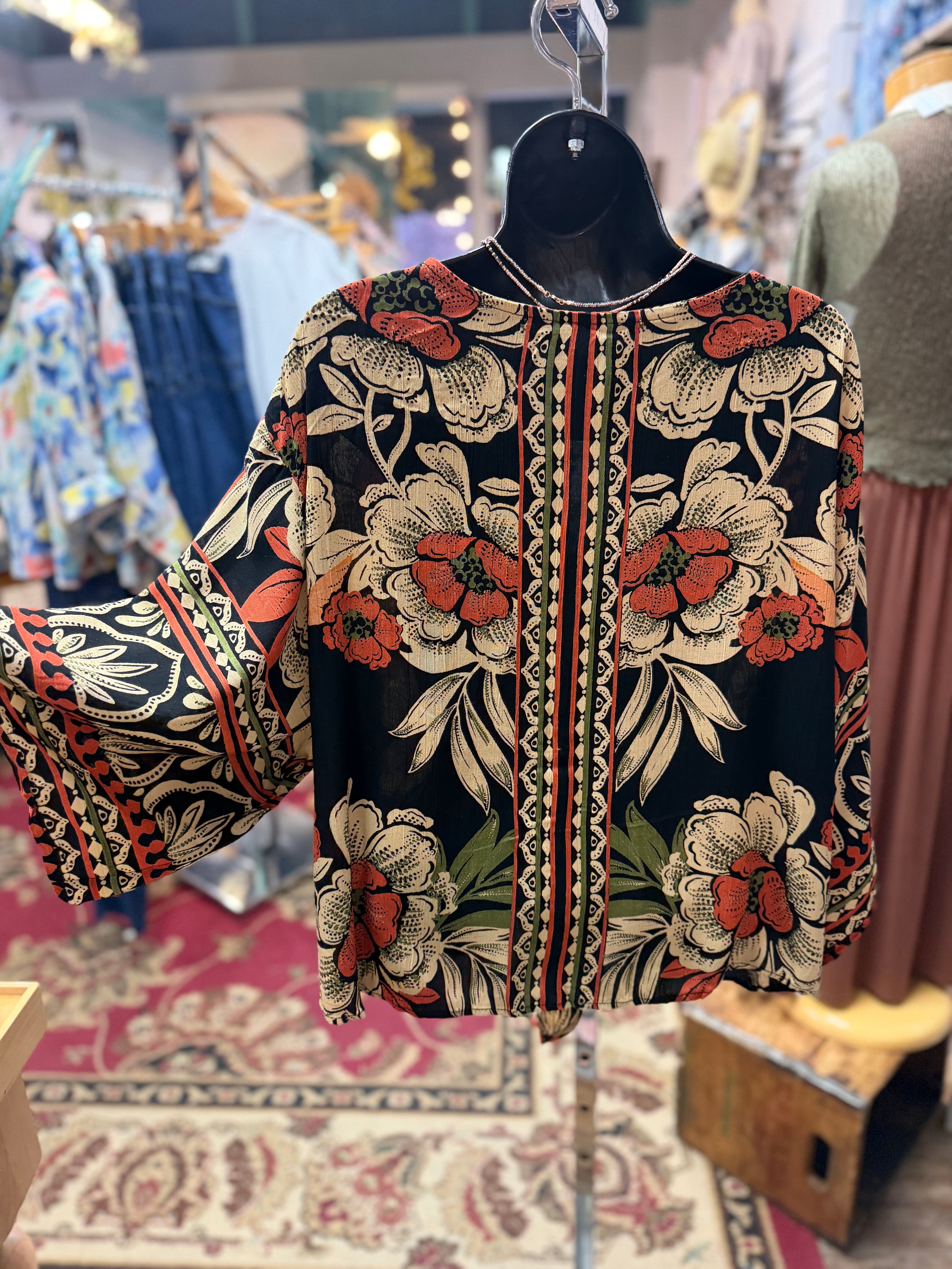Black print kimono style blouse with tie front